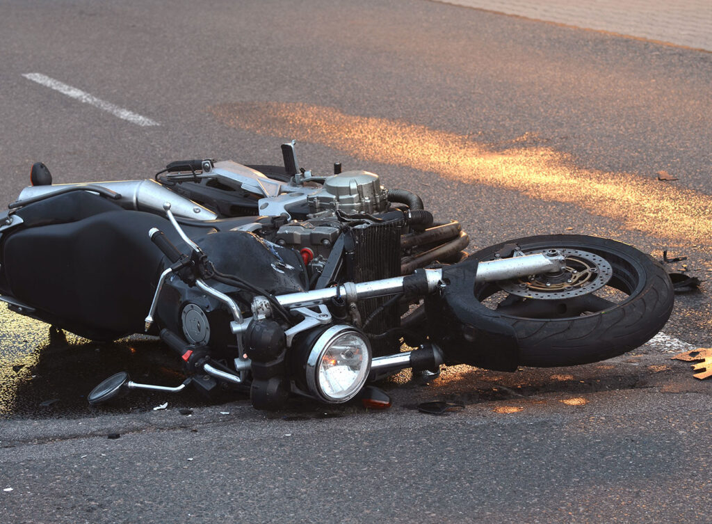 motorcycle laying on the ground after a collision springfield il